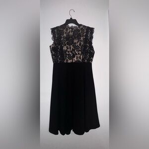 Formal dress with lacing detail.